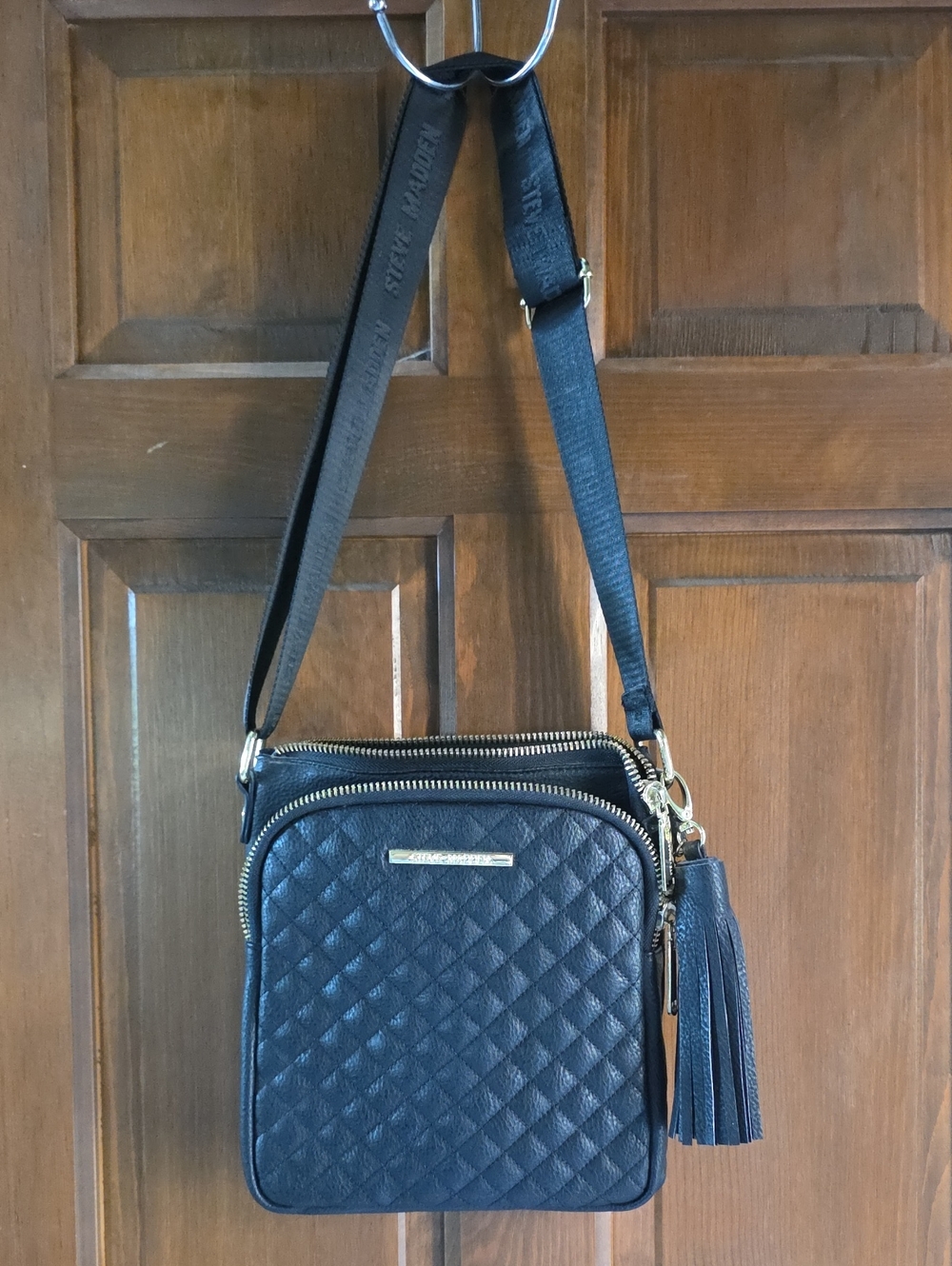 Steve Madden Quilted Black Adjuatable Crossbody with Tassel Accent Like New